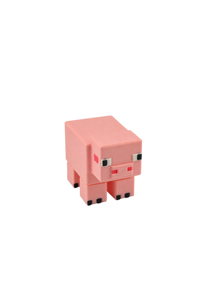 A pink blocky pig toy or figurine with pixelated eyes and snout, shown on a plain white background.