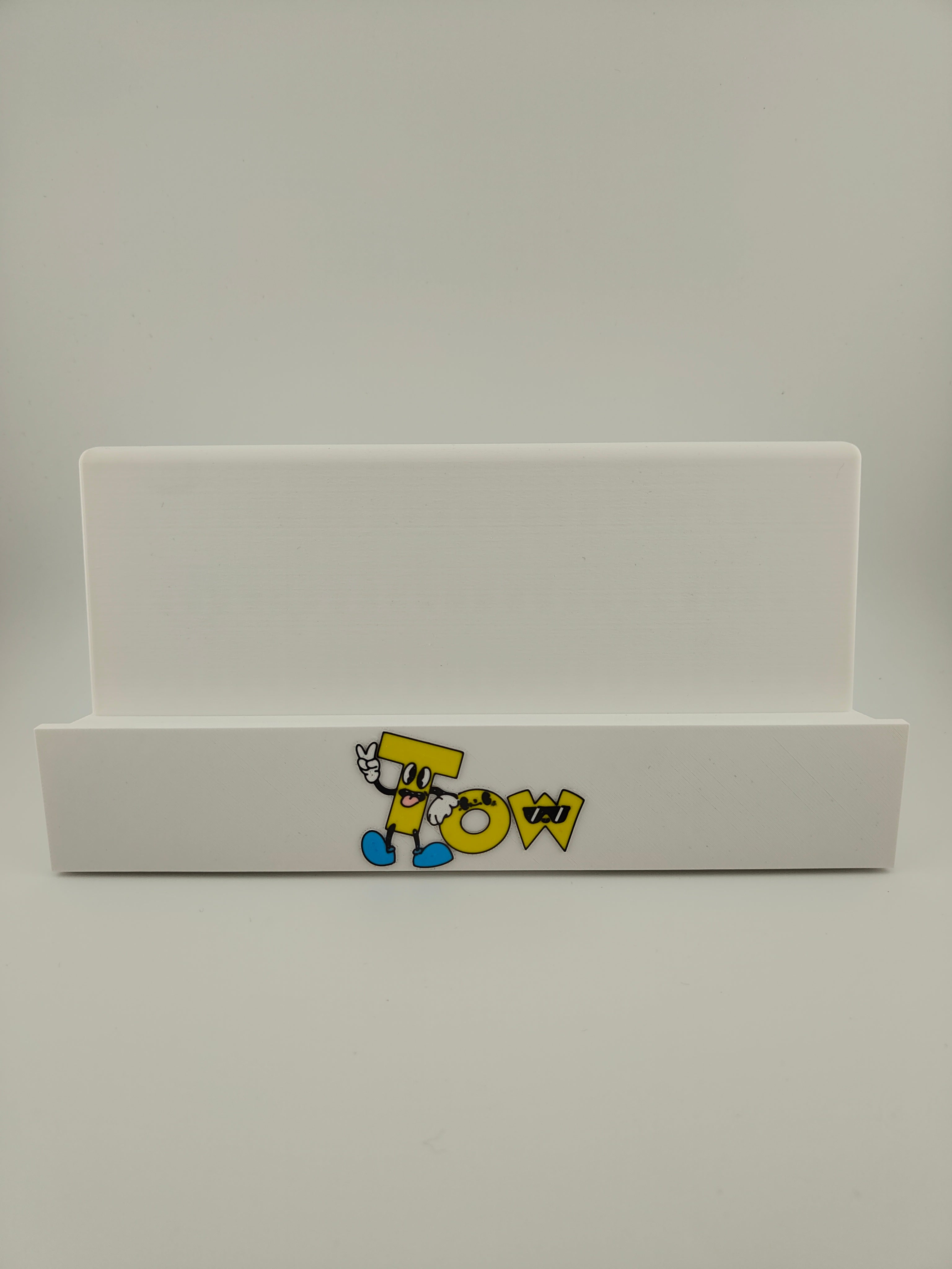 white trading card display stand with company logo